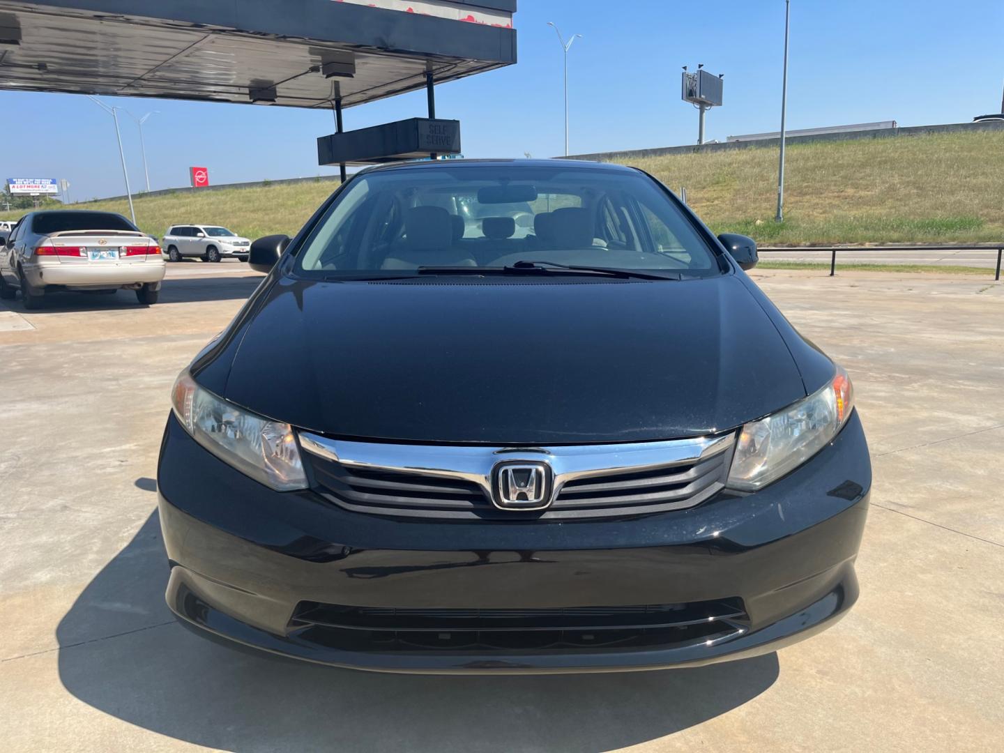 2012 BLACK HONDA CIVIC EX-L EX-L Sedan 5-Speed AT (2HGFB2F97CH) with an 1.8L L4 SOHC 16V engine, 5-Speed Automatic transmission, located at 8101 E. Skelly Dr., Tulsa, OK, 74129, (918) 592-3593, 36.121891, -95.888802 - Photo#3