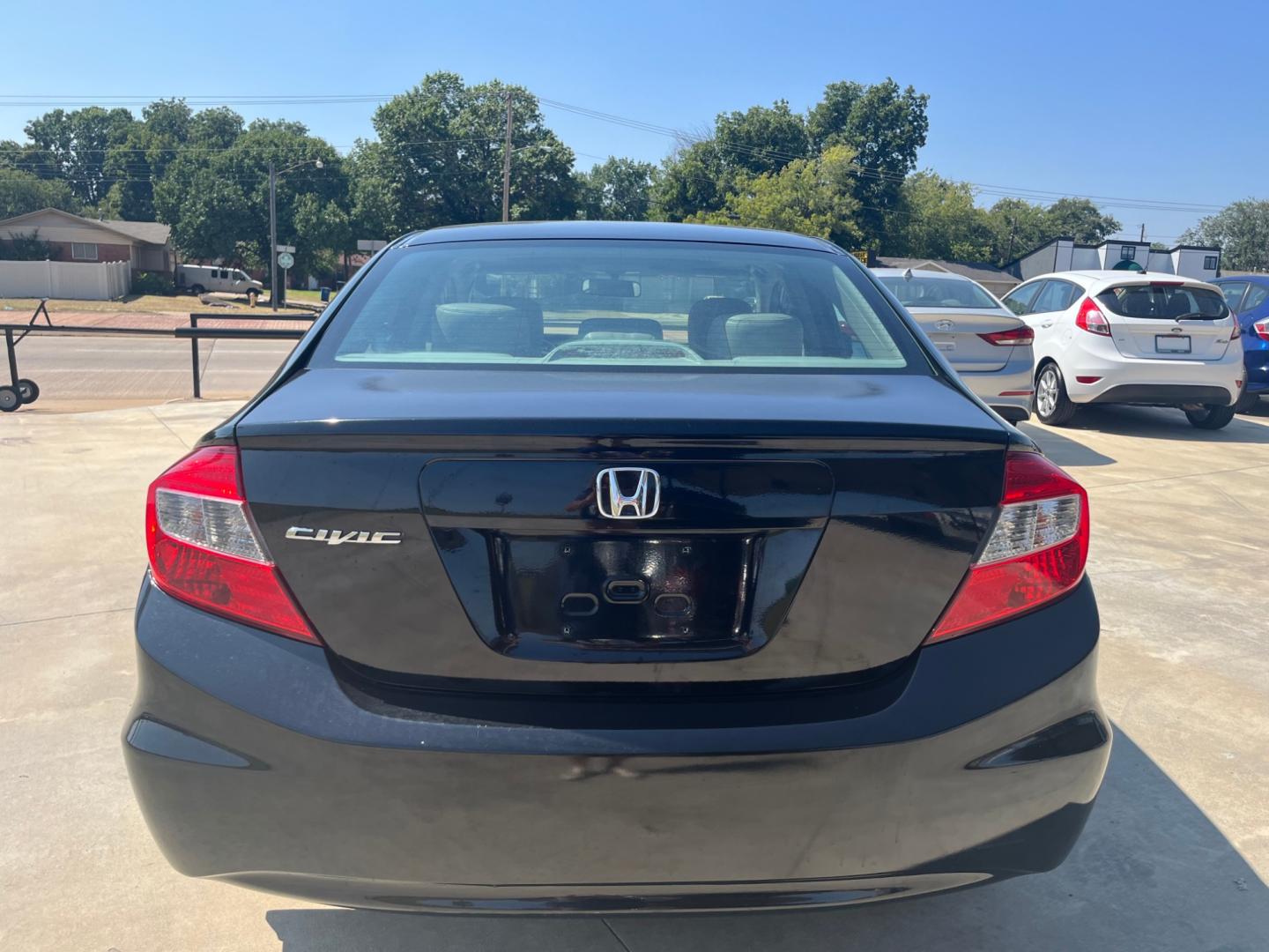 2012 BLACK HONDA CIVIC EX-L EX-L Sedan 5-Speed AT (2HGFB2F97CH) with an 1.8L L4 SOHC 16V engine, 5-Speed Automatic transmission, located at 8101 E. Skelly Dr., Tulsa, OK, 74129, (918) 592-3593, 36.121891, -95.888802 - Photo#2