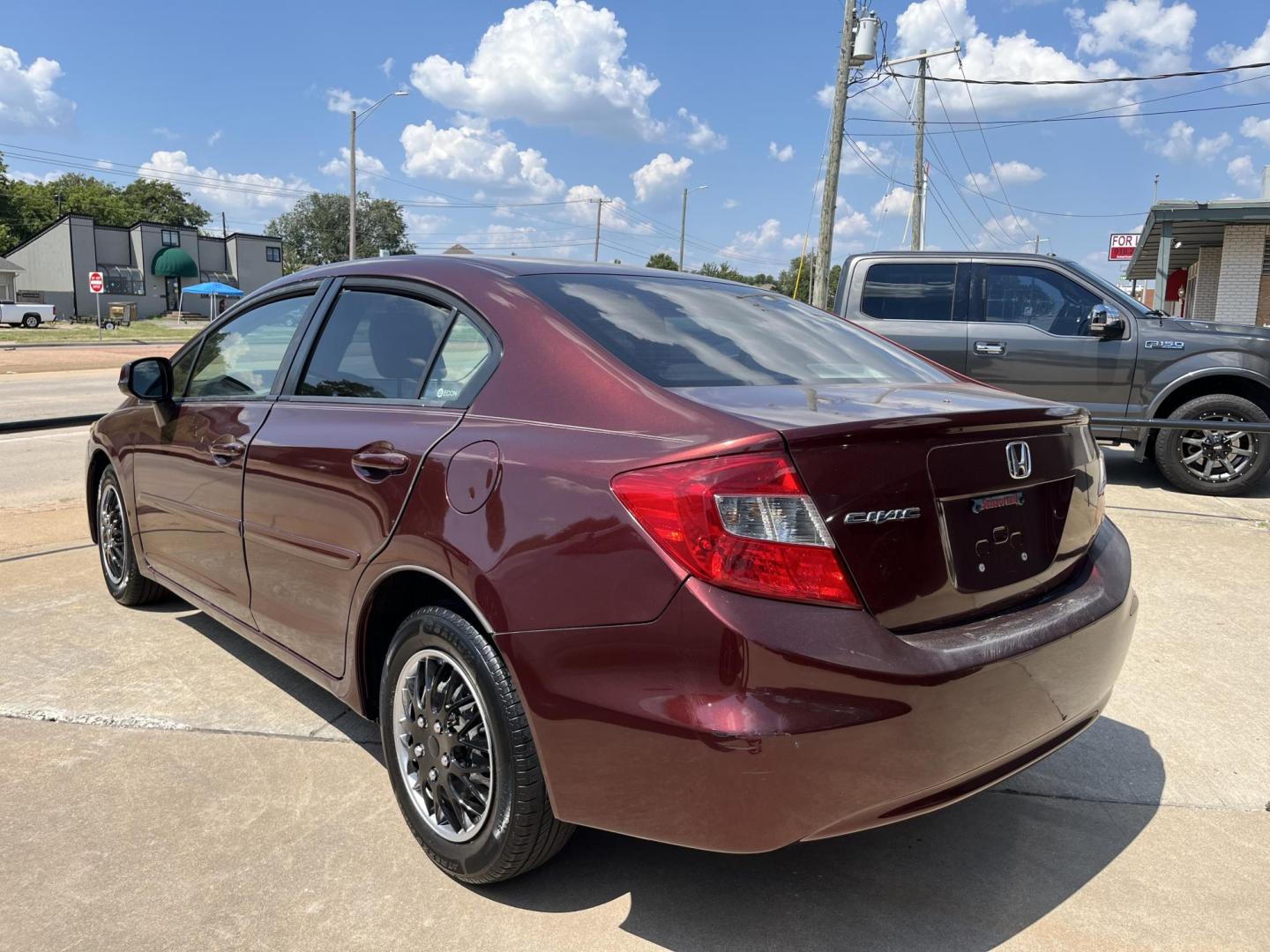 2012 MAROON HONDA CIVIC LX LX Sedan 5-Speed AT (19XFB2F52CE) with an 1.8L L4 SOHC 16V engine, 5-Speed Automatic transmission, located at 8101 E. Skelly Dr., Tulsa, OK, 74129, (918) 592-3593, 36.121891, -95.888802 - Photo#1