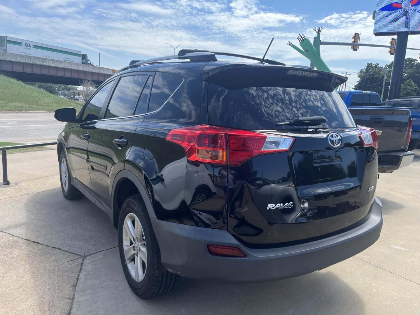 2014 BLACK TOYOTA RAV4 XLE XLE FWD (2T3WFREV1EW) with an 2.5L L4 DOHC 16V engine, 6-Speed Automatic transmission, located at 8101 E. Skelly Dr., Tulsa, OK, 74129, (918) 592-3593, 36.121891, -95.888802 - Photo#1