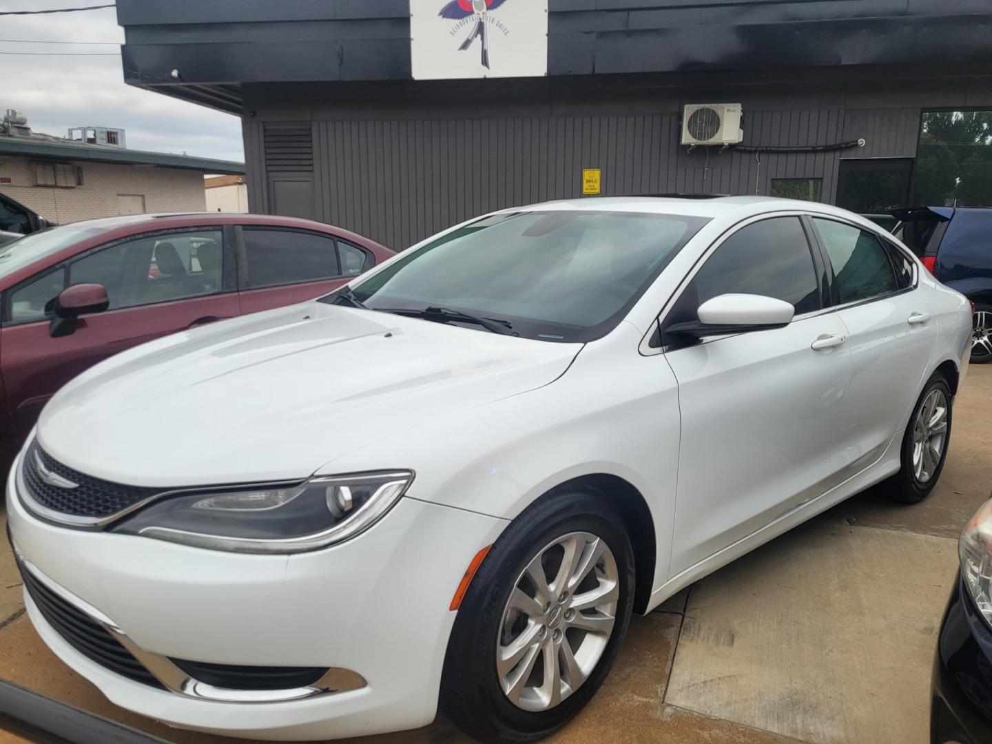 2015 WHITE CHRYSLER 200 LIMITED Limited (1C3CCCABXFN) with an 2.4L L4 DOHC 16V engine, 9-Speed Automatic transmission, located at 8101 E. Skelly Dr., Tulsa, OK, 74129, (918) 592-3593, 36.121891, -95.888802 - Photo#3