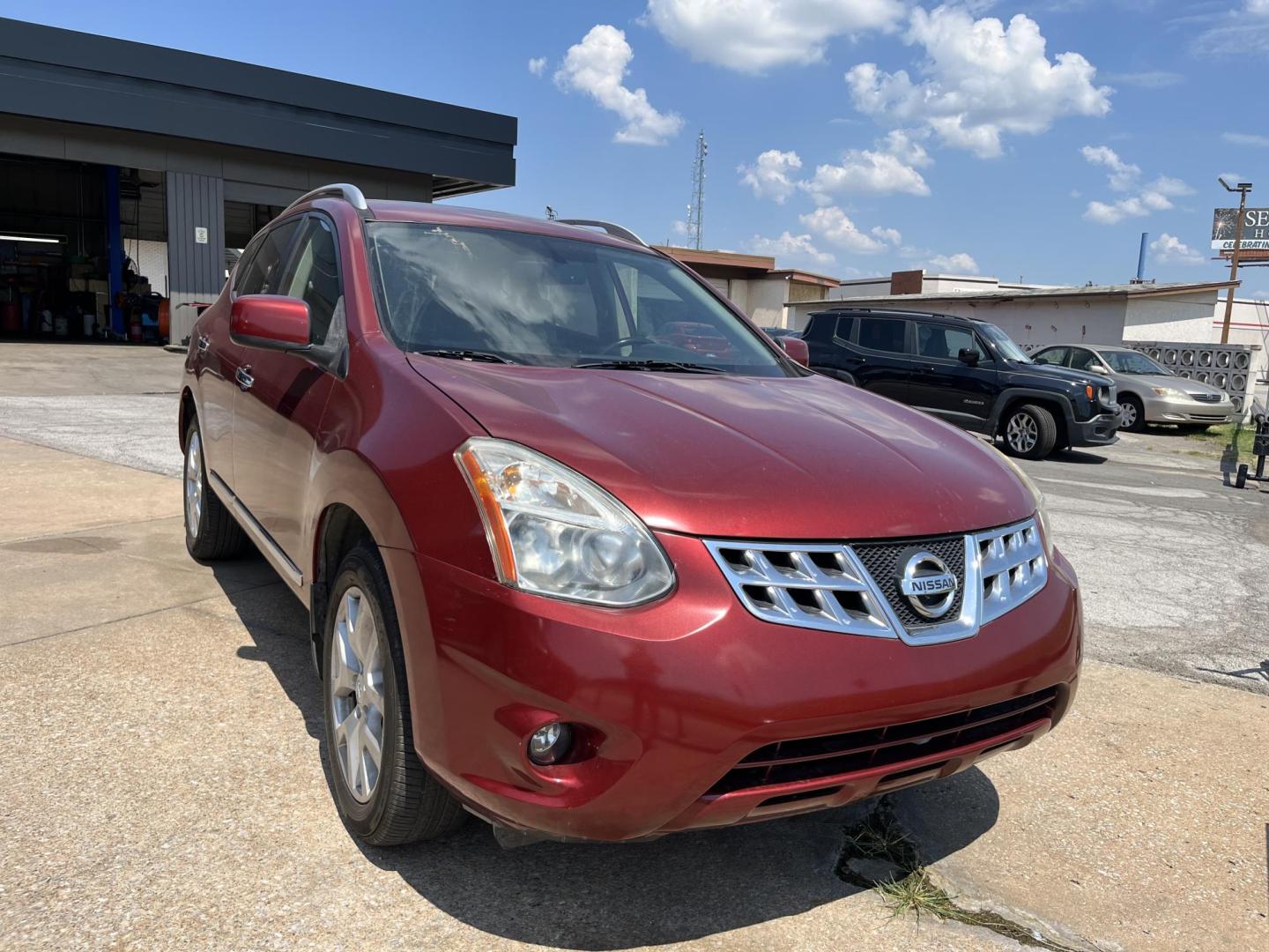 2011 RED NISSAN ROGUE S; SL; SV S AWD (JN8AS5MV5BW) with an 2.5L L4 DOHC 16V engine, CVT transmission, located at 8101 E. Skelly Dr., Tulsa, OK, 74129, (918) 592-3593, 36.121891, -95.888802 - Photo#0