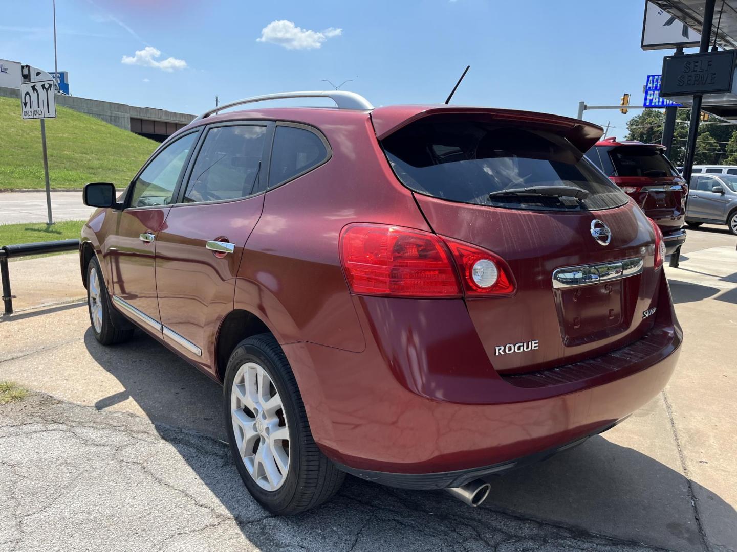 2011 RED NISSAN ROGUE S; SL; SV S AWD (JN8AS5MV5BW) with an 2.5L L4 DOHC 16V engine, CVT transmission, located at 8101 E. Skelly Dr., Tulsa, OK, 74129, (918) 592-3593, 36.121891, -95.888802 - Photo#1