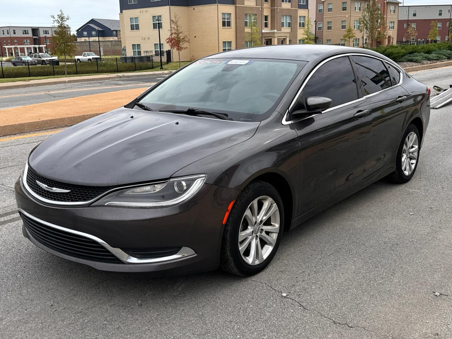 2015 GRAY CHRYSLER 200 LIMITED Limited (1C3CCCAB1FN) with an 2.4L L4 DOHC 16V engine, 9-Speed Automatic transmission, located at 8101 E. Skelly Dr., Tulsa, OK, 74129, (918) 592-3593, 36.121891, -95.888802 - Photo#0