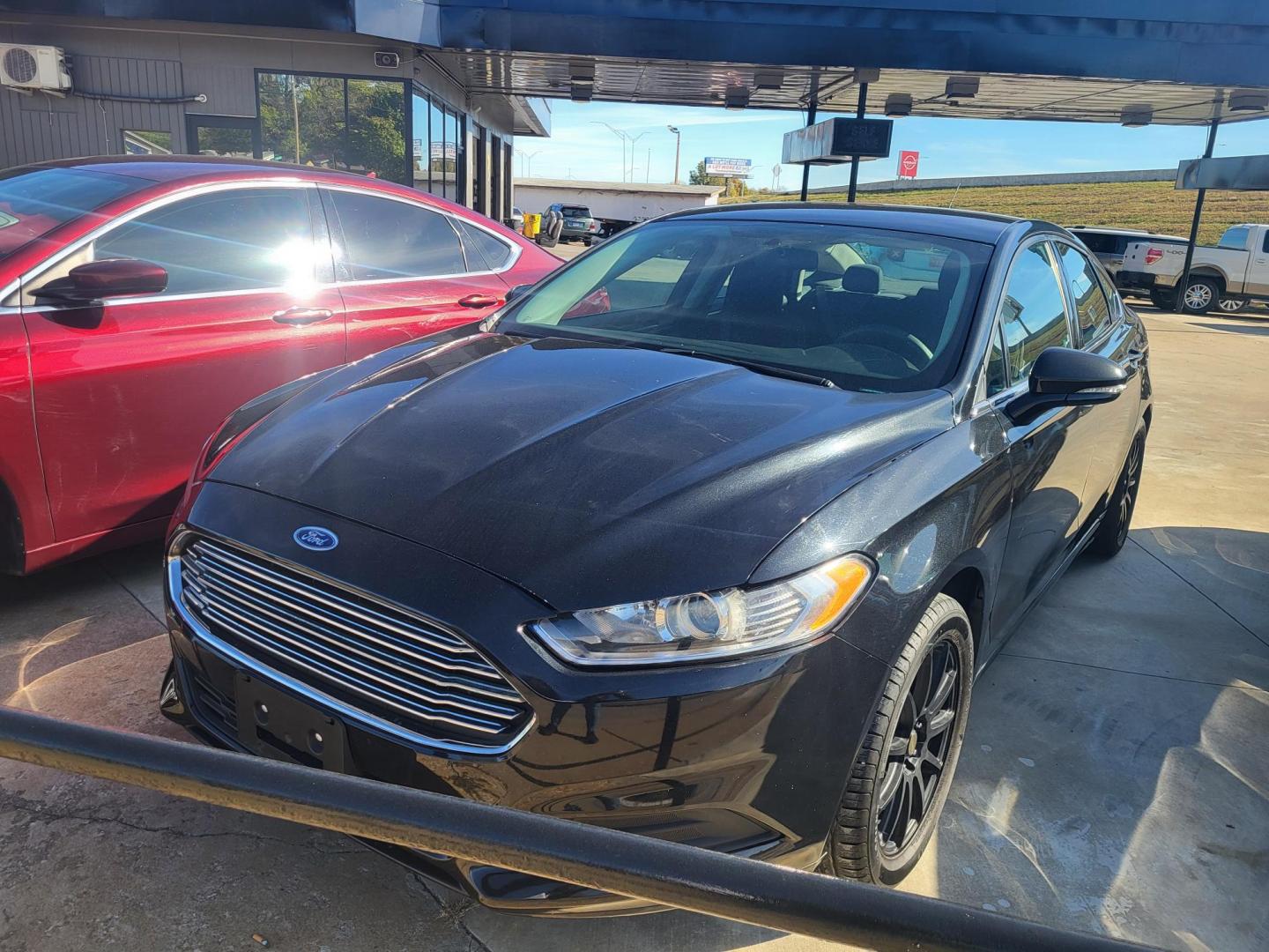 2014 BLACK FORD FUSION SE SE (1FA6P0H79E5) with an 2.5L L4 DOHC 16V engine, located at 8101 E. Skelly Dr., Tulsa, OK, 74129, (918) 592-3593, 36.121891, -95.888802 - Photo#0