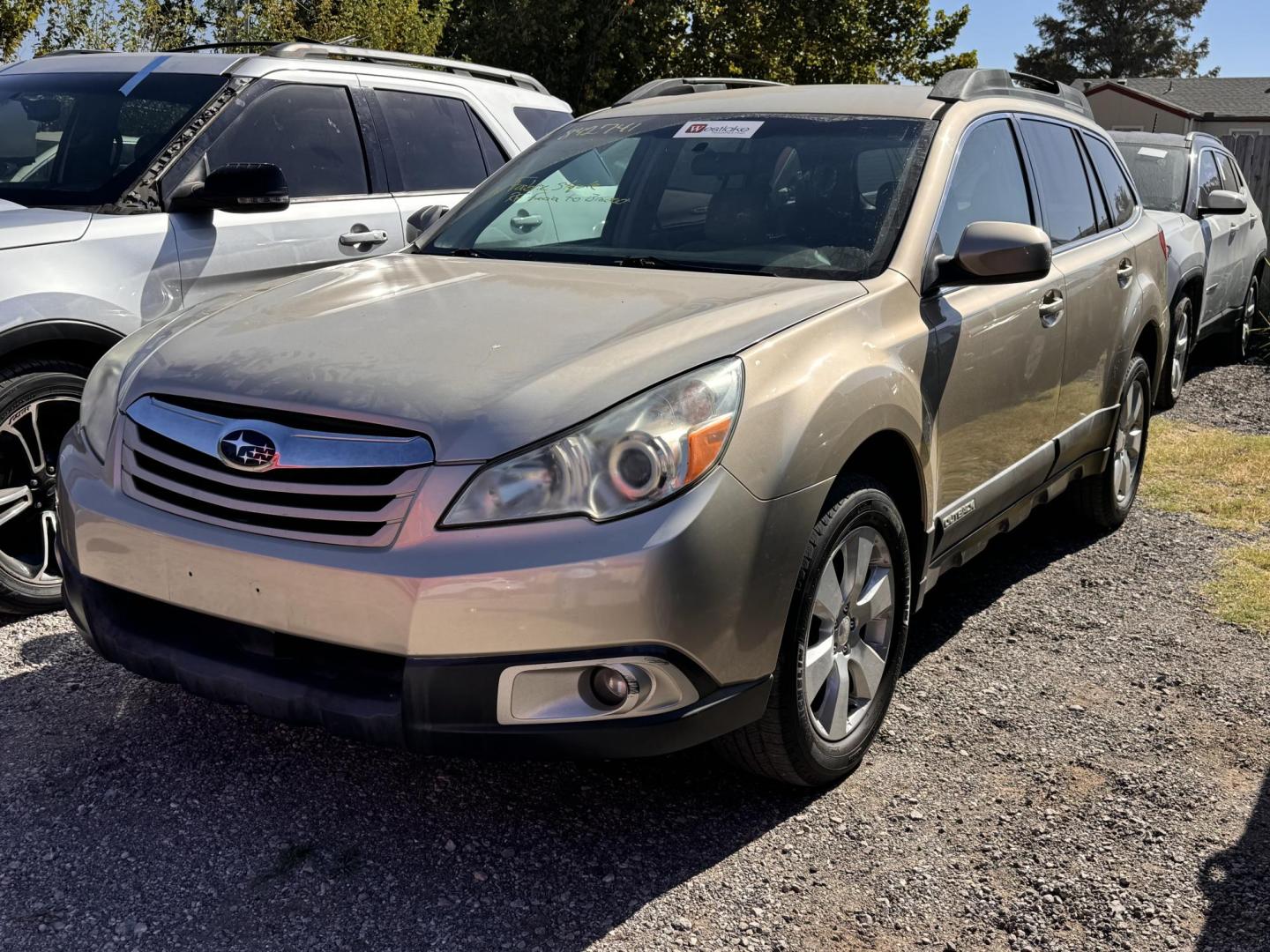 2010 GOLD Subaru Outback 2.5i Premium (4S4BRCCC7A3) with an 2.5L H4 DOHC 16V engine, CVT transmission, located at 8101 E. Skelly Dr., Tulsa, OK, 74129, (918) 592-3593, 36.121891, -95.888802 - Photo#0