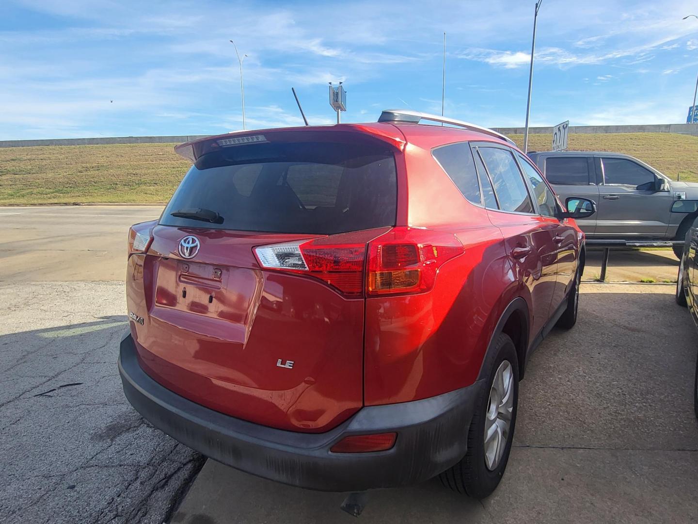 2015 RED TOYOTA RAV4 LE LE FWD (JTMZFREVXFJ) with an 2.5L L4 DOHC 16V engine, 6-Speed Automatic transmission, located at 8101 E. Skelly Dr., Tulsa, OK, 74129, (918) 592-3593, 36.121891, -95.888802 - Photo#1