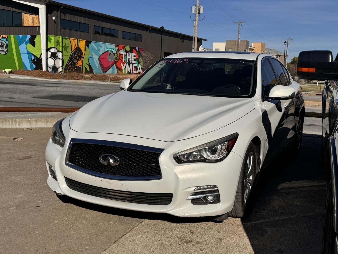 2015 WHITE INFINITI Q50 BASE; PREMIUM; S Premium (JN1BV7AP2FM) with an 3.7L V6 DOHC 24V HYBRID engine, 7-Speed Automatic transmission, located at 8101 E. Skelly Dr., Tulsa, OK, 74129, (918) 592-3593, 36.121891, -95.888802 - Photo#0