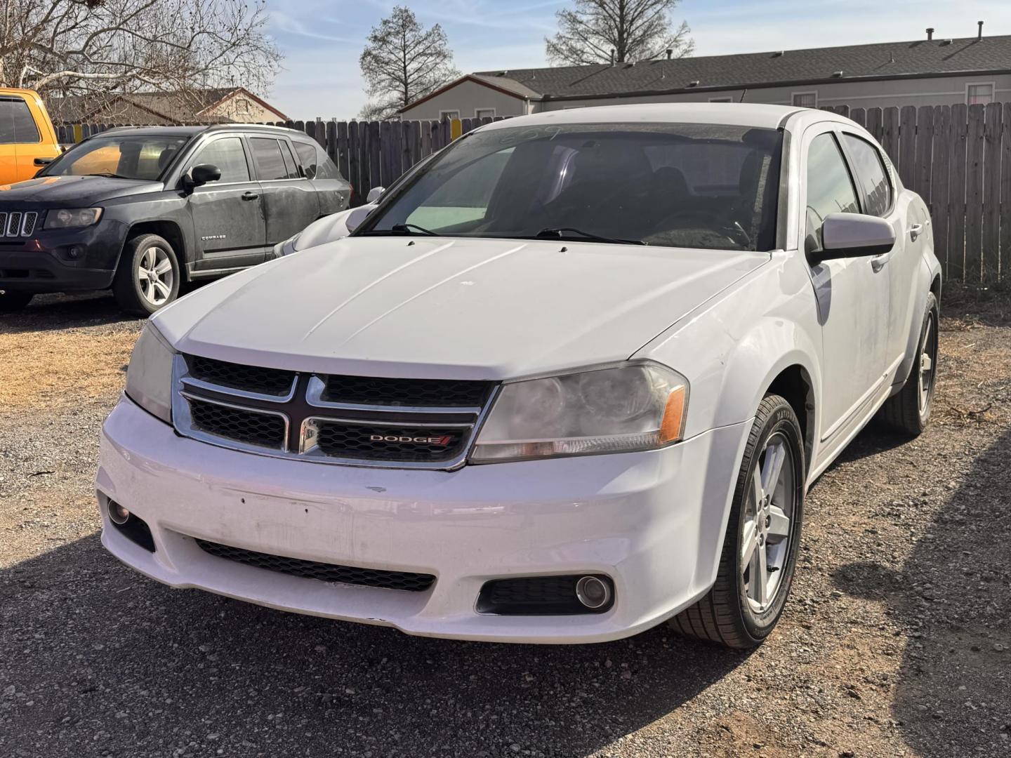 2013 WHITE Dodge Avenger SXT (1C3CDZCB4DN) with an 2.4L L4 DOHC 16V engine, 6-Speed Automatic transmission, located at 8101 E. Skelly Dr., Tulsa, OK, 74129, (918) 592-3593, 36.121891, -95.888802 - Photo#0