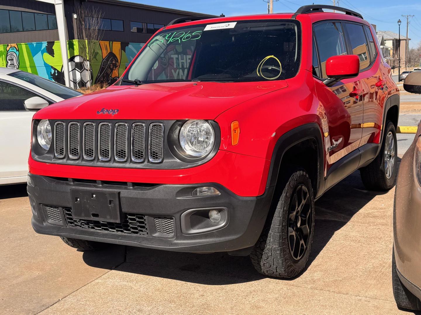 2016 RED Jeep Renegade Latitude 4WD (ZACCJBBT4GP) with an 2.4L L4 DOHC 16V engine, 6M transmission, located at 8101 E. Skelly Dr., Tulsa, OK, 74129, (918) 592-3593, 36.121891, -95.888802 - Photo#0