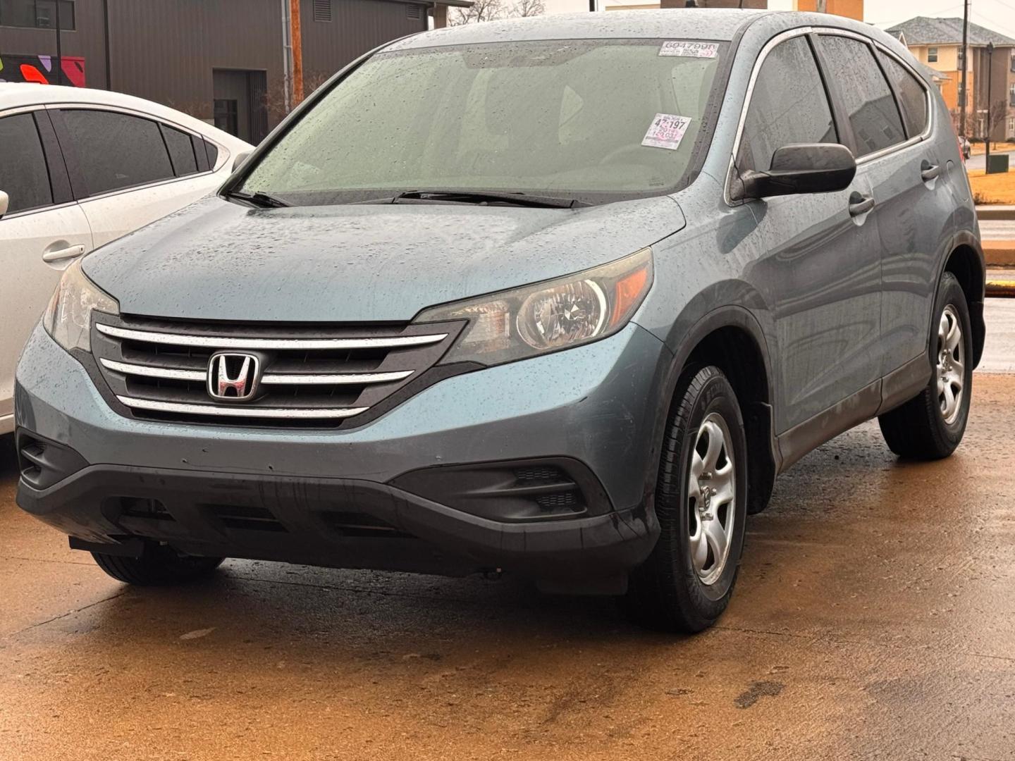 2014 BLUE Honda CR-V LX 2WD 5-Speed AT (2HKRM3H38EH) with an 2.4L L4 DOHC 16V engine, 5-Speed Automatic transmission, located at 8101 E. Skelly Dr., Tulsa, OK, 74129, (918) 592-3593, 36.121891, -95.888802 - Photo#0