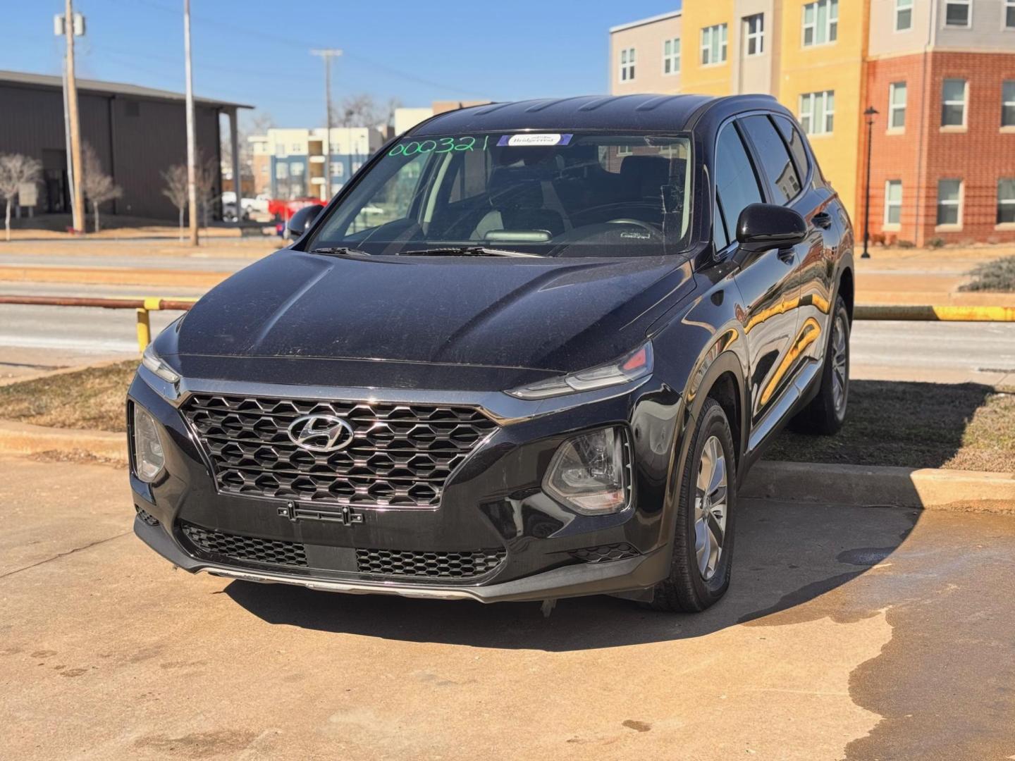 2019 BLACK Hyundai Santa Fe SE 2.4 (5NMS23AD6KH) with an 2.4L L4 DOHC 16V engine, 8A transmission, located at 8101 E. Skelly Dr., Tulsa, OK, 74129, (918) 592-3593, 36.121891, -95.888802 - Photo#0